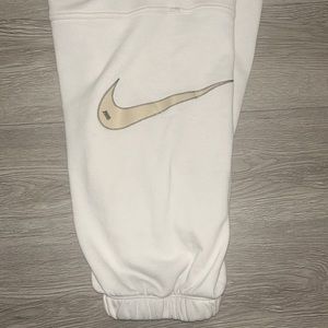 Cream oversized Nike sweatpants